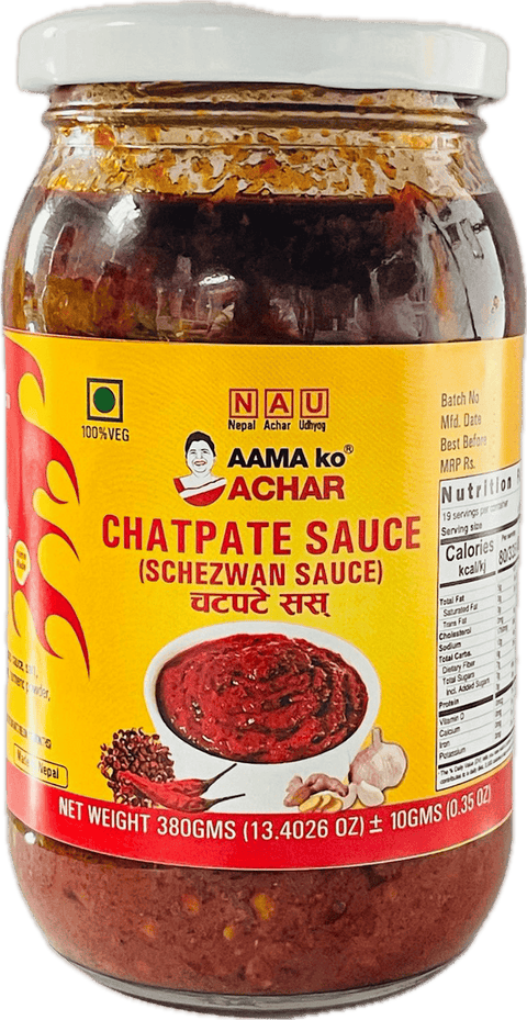A glass bottle of Chatpate Sauce (Schezwan Sauce) from Aama ko Achar of 380g