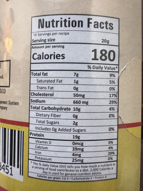 A glass bottle of Raga Achar (Water Buffalo Pickle) from Kalo Kalki of 380g with nutrition facts