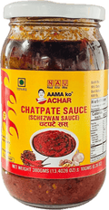 A glass bottle of Chatpate Sauce (Schezwan Sauce) from Aama ko Achar of 380g