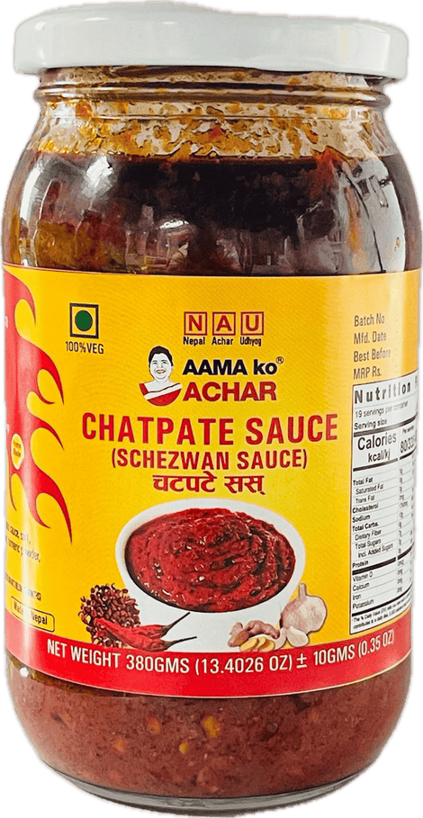 A glass bottle of Chatpate Sauce (Schezwan Sauce) from Aama ko Achar of 380g