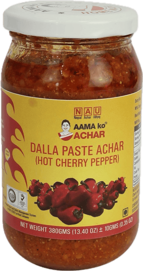 A glass bottle of Dalla Paste Achar (Hot Cherry Pepper) from Aama ko Achar of 380g
