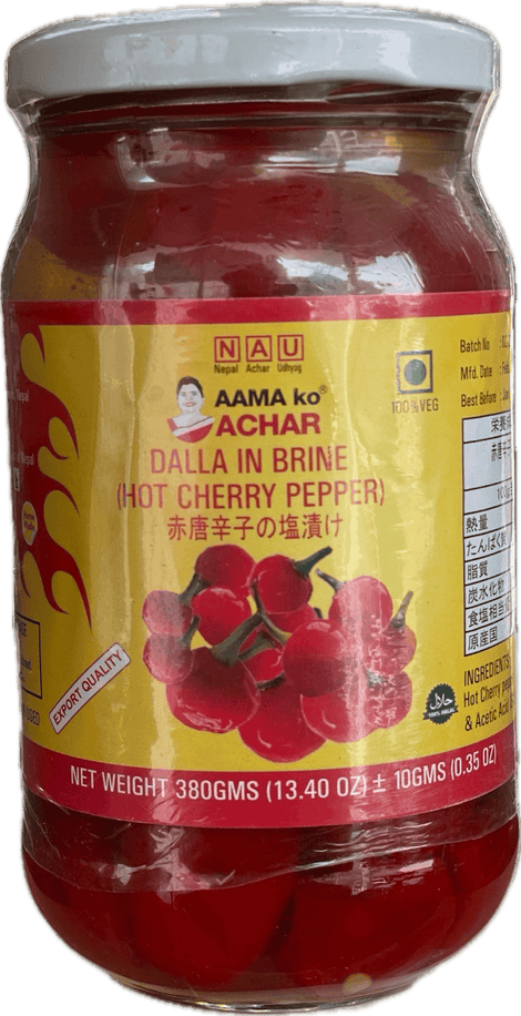 A glass bottle of Dalla in Brine (Hot Cherry Peppers) from Aama ko Achar of 380g