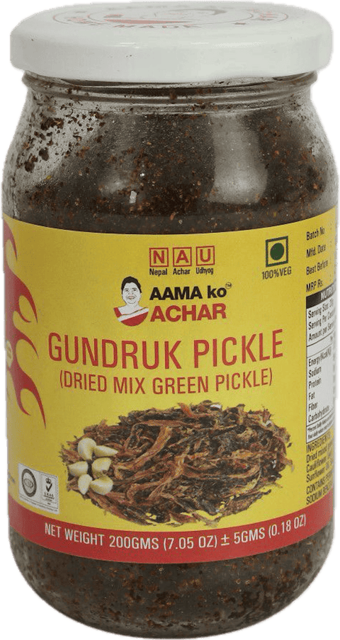A glass bottle of Gundruk Pickle (Dried Mix Green Pickle) from Aama ko Achar of 200g