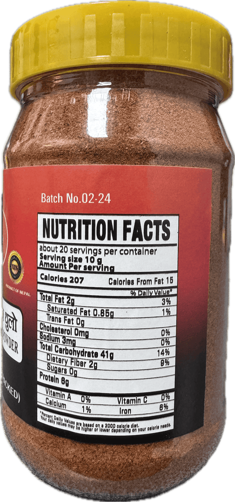 A plastic bottle of Manang Red Chilli, Garlic Powder from Khukuri of 200g with nutrition facts