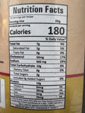 A glass bottle showing Kukhura Achar (Chicken Pickle) from Kalo Kalki of 380g with nutrition facts