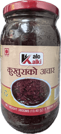 A glass bottle showing Kukhura Achar (Chicken Pickle) from Kalo Kalki of 380g