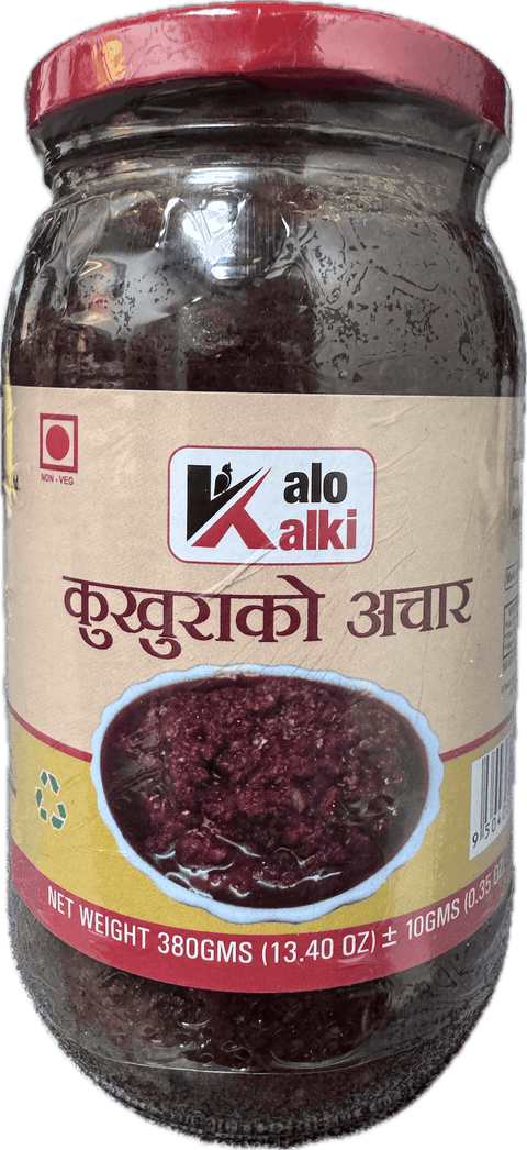 A glass bottle showing Kukhura Achar (Chicken Pickle) from Kalo Kalki of 380g