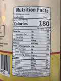 A glass bottle of Raga Achar (Water Buffalo Pickle) from Kalo Kalki of 380g with nutrition facts